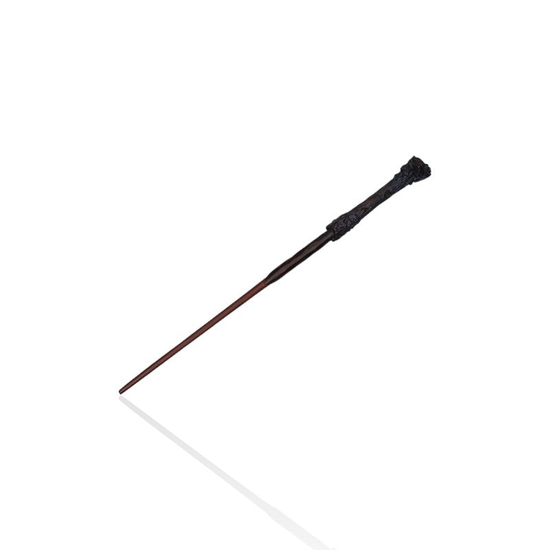 Harry Potter’s wand replica, featuring a textured handle and brown shaft, displayed on a white background