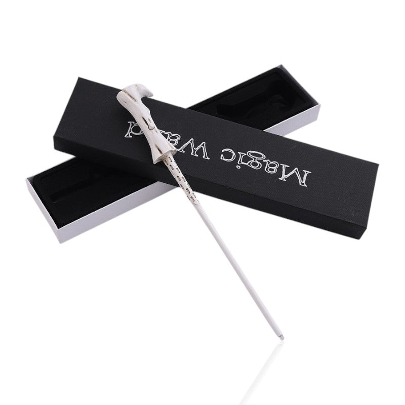 White Voldemort-inspired light-up wand with an illuminated tip, displayed in a luxury 'Magic Wand' box